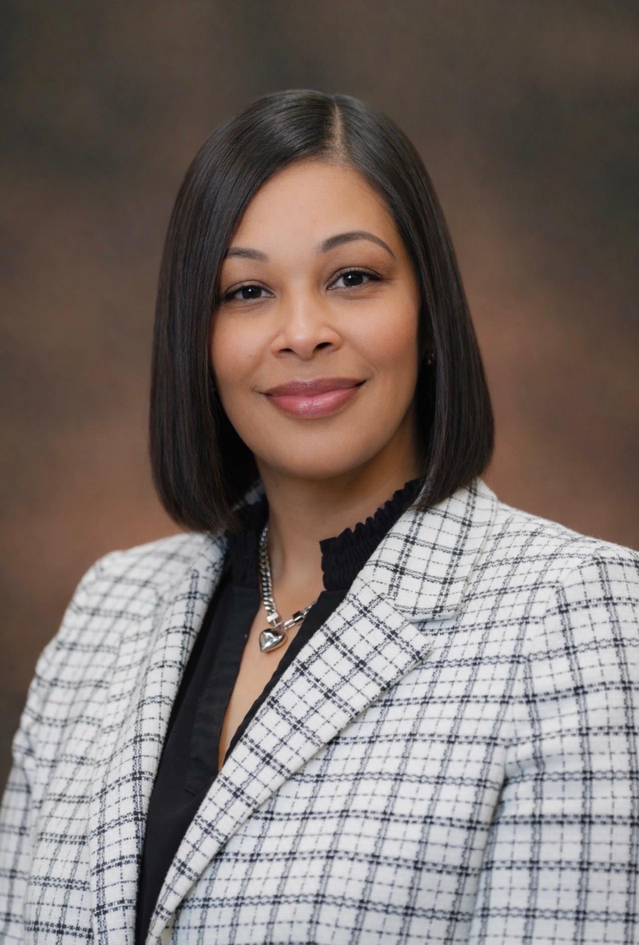 Member  Dr.  Shontier Barnes