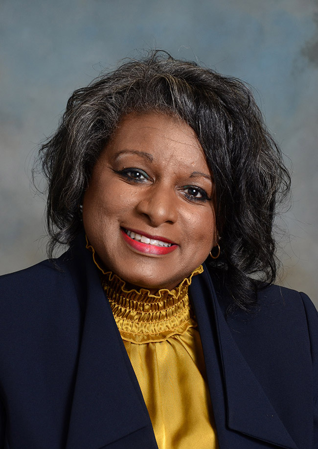 Member  Dr. Sundra M. Woodford 