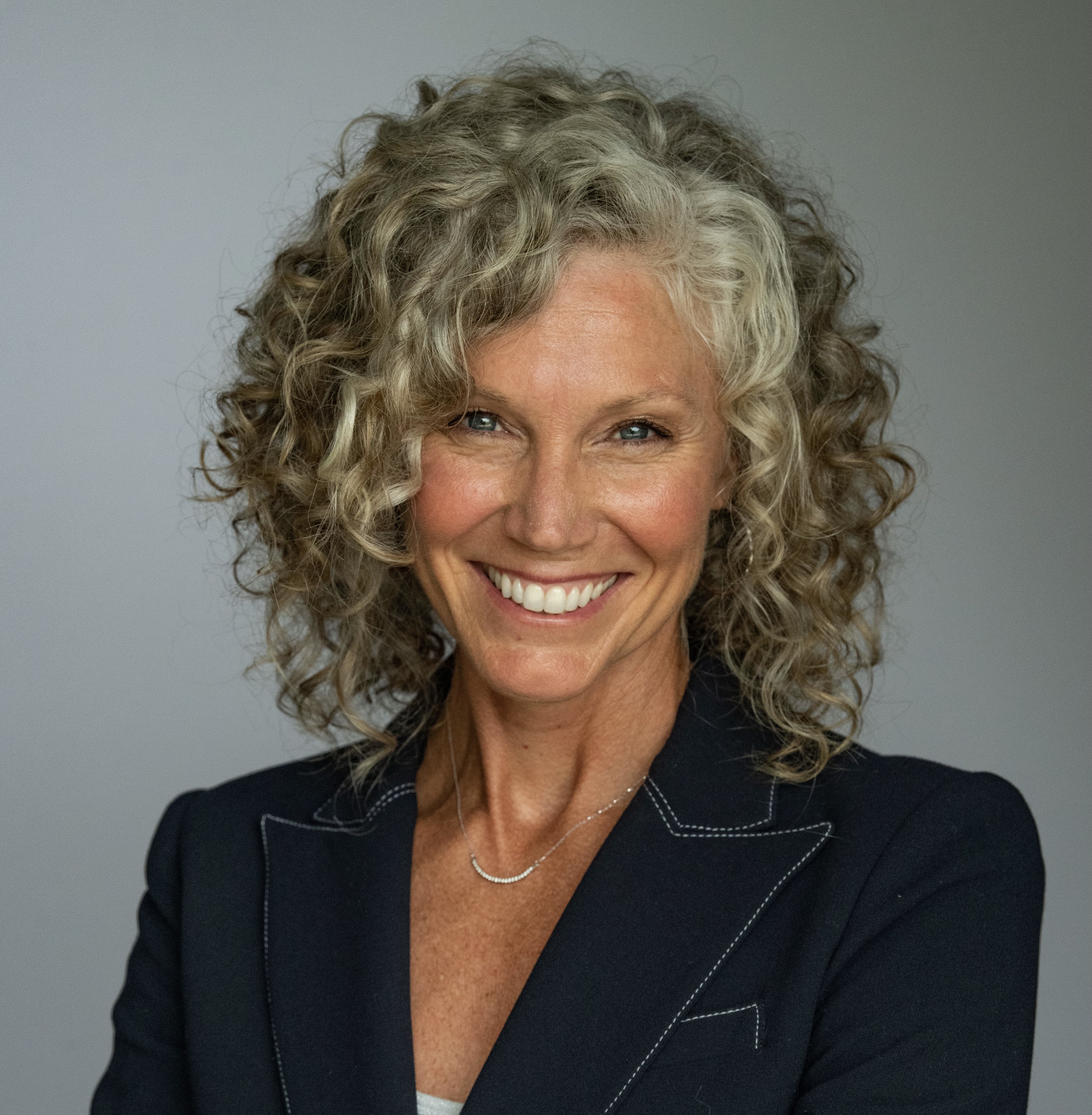 Member  Ms. Kristi Garrett